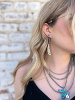 Feathered earrings
