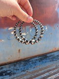Graduating Navajo pearl hoops