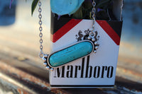 Turquoise Torn necklace