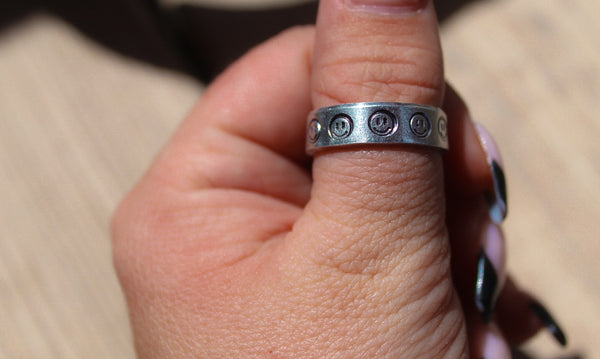 Smiley face stamped ring